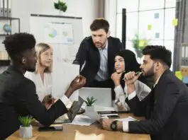 Man with hearing loss in meeting