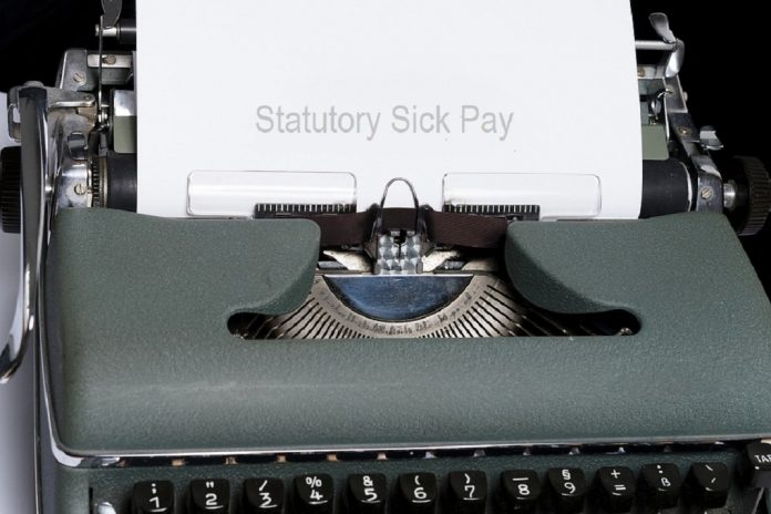 typewriter with statutory sick pay heading