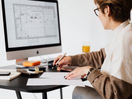 menopausal woman working at desk