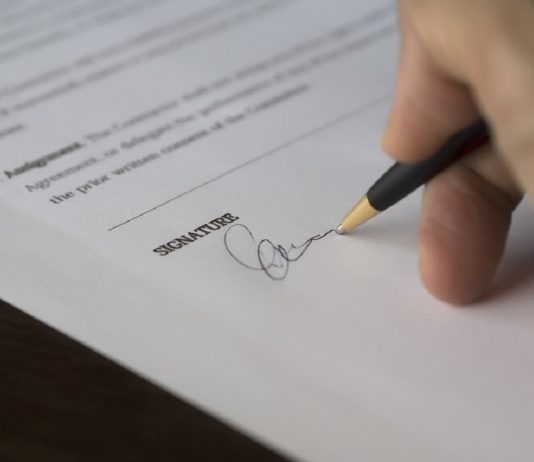 person signing contract of employment