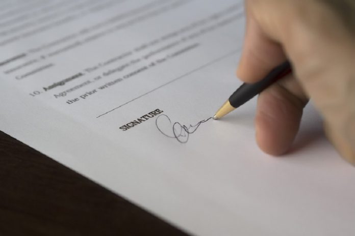 person signing contract of employment