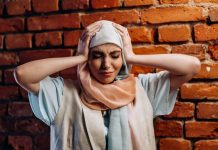 distressed woman wearing hijab