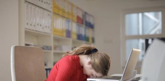 office worker asleep at desk