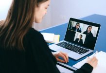 team leader on zoom call to remote workers
