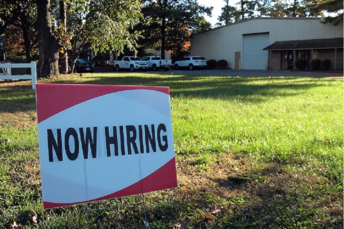 Hiring sign outside factory