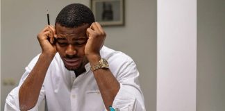 depressed man at workstation