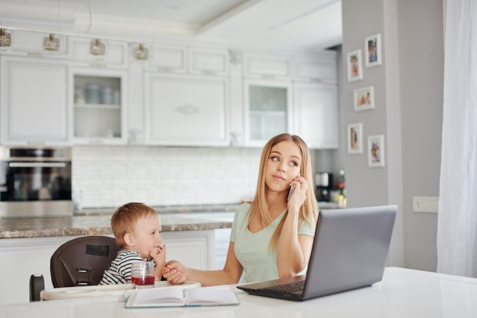 Working from home mother with infant