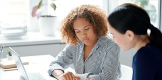 employees discussing share options