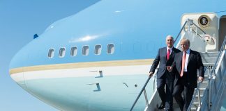 donald trump and mike pence walking down the steps of air force one 1