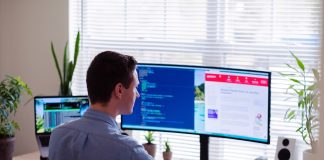 HR professional working at computer
